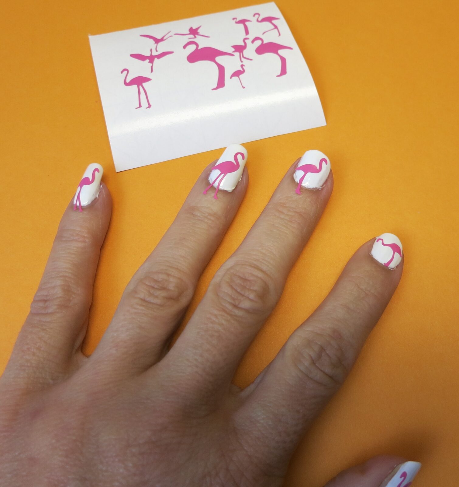 Learn how simple it is to make your own adorable flamingo nail art! No